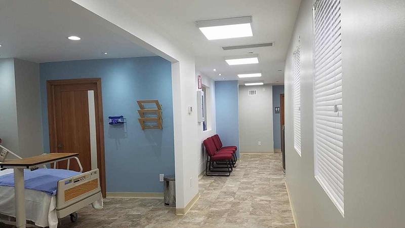 Corridor with LED edge-lit panels