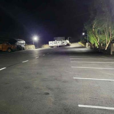 Photo linking to more pictures of the parking lot during the night
